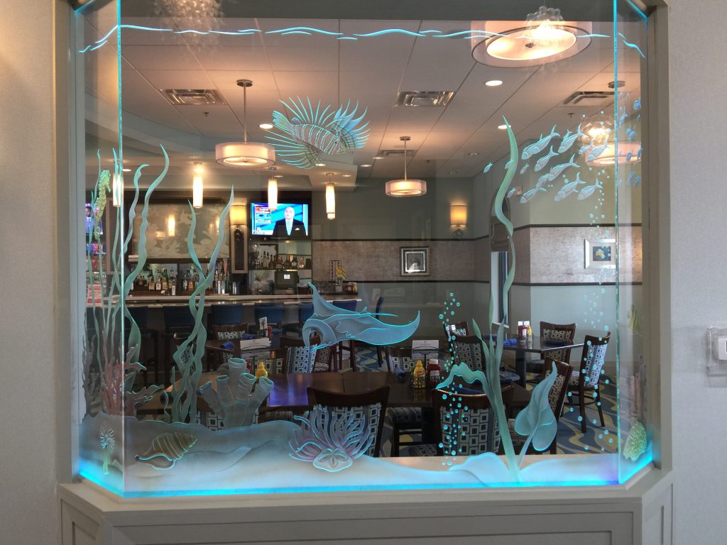 Bar and dining room behind etched aquarium glass